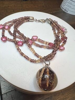 Multi-Strand Pink and Brown Beaded with glass pendant bracelet